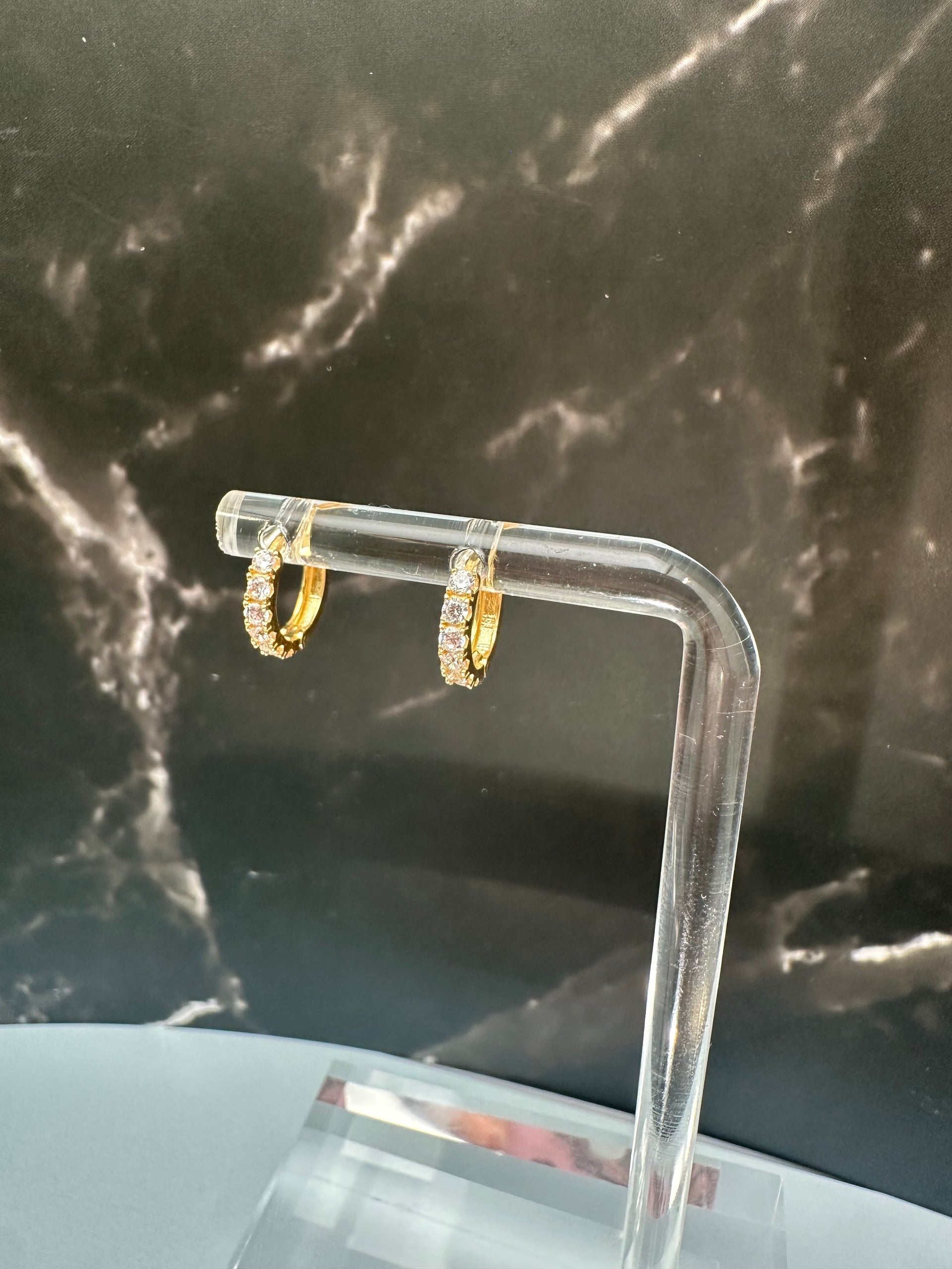 The Luce Eterna Huggies: A Symphony of Fire and 18k Italian Gold