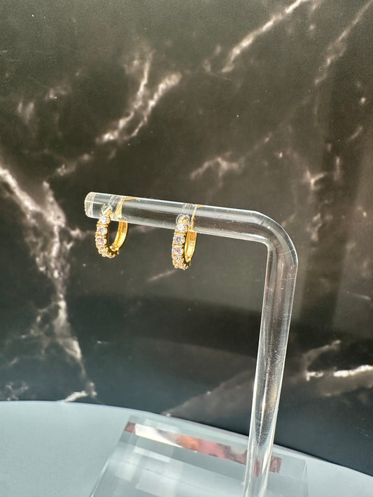 The Luce Eterna Huggies: A Symphony of Fire and 18k Italian Gold