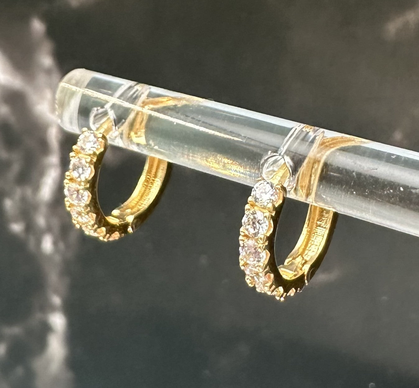 The Luce Eterna Huggies: A Symphony of Fire and 18k Italian Gold