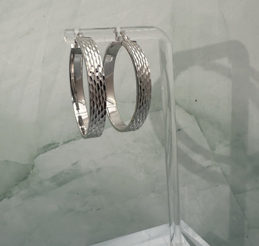 The Argento Martellato Hoops: A Masterpiece in Sculpted Silver