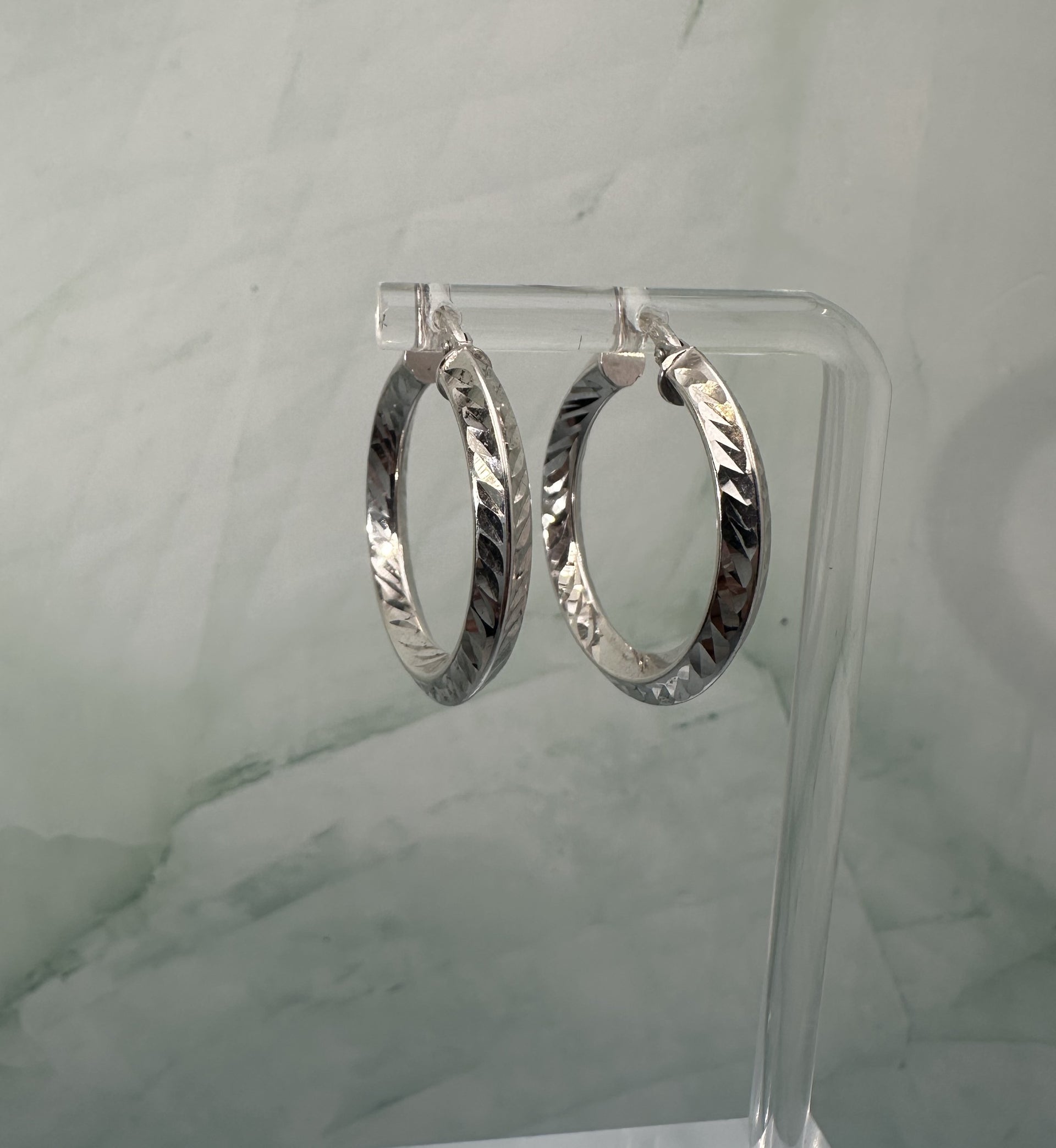 The Argento Intreccio Hoops: A Masterpiece in Sculpted Silver