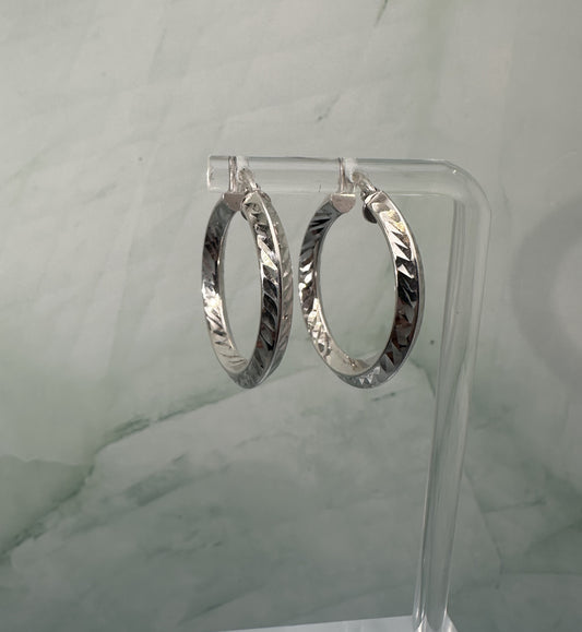 The Argento Intreccio Hoops: A Masterpiece in Sculpted Silver