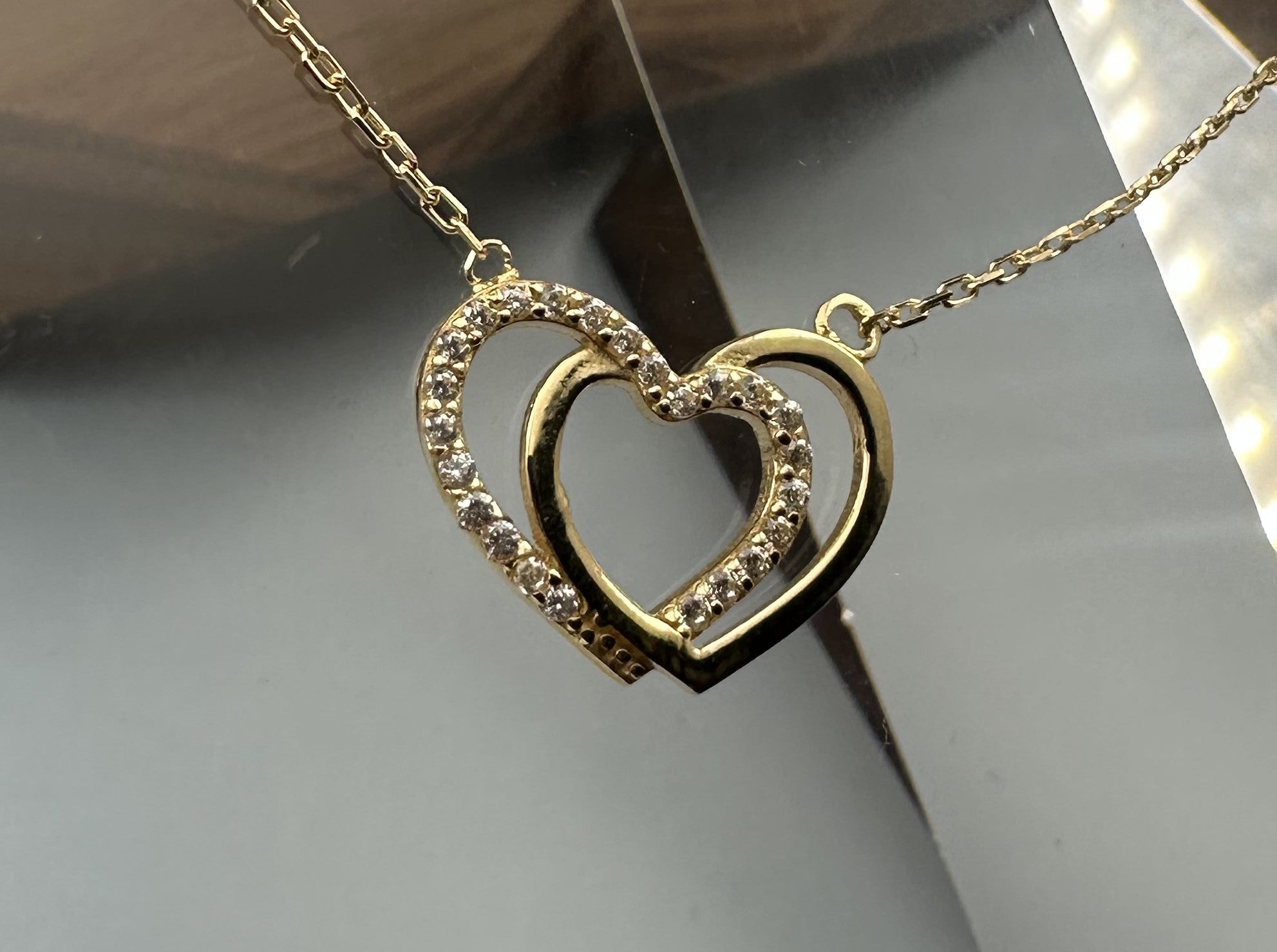 The Cuori Intrecciati Necklace: An 18-Inch Masterpiece in 18k Gold
