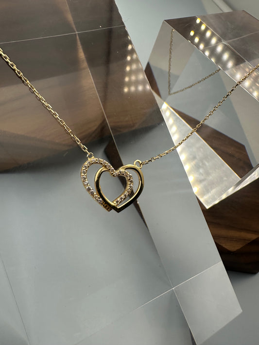 The Cuori Intrecciati Necklace: An 18-Inch Masterpiece in 18k Gold