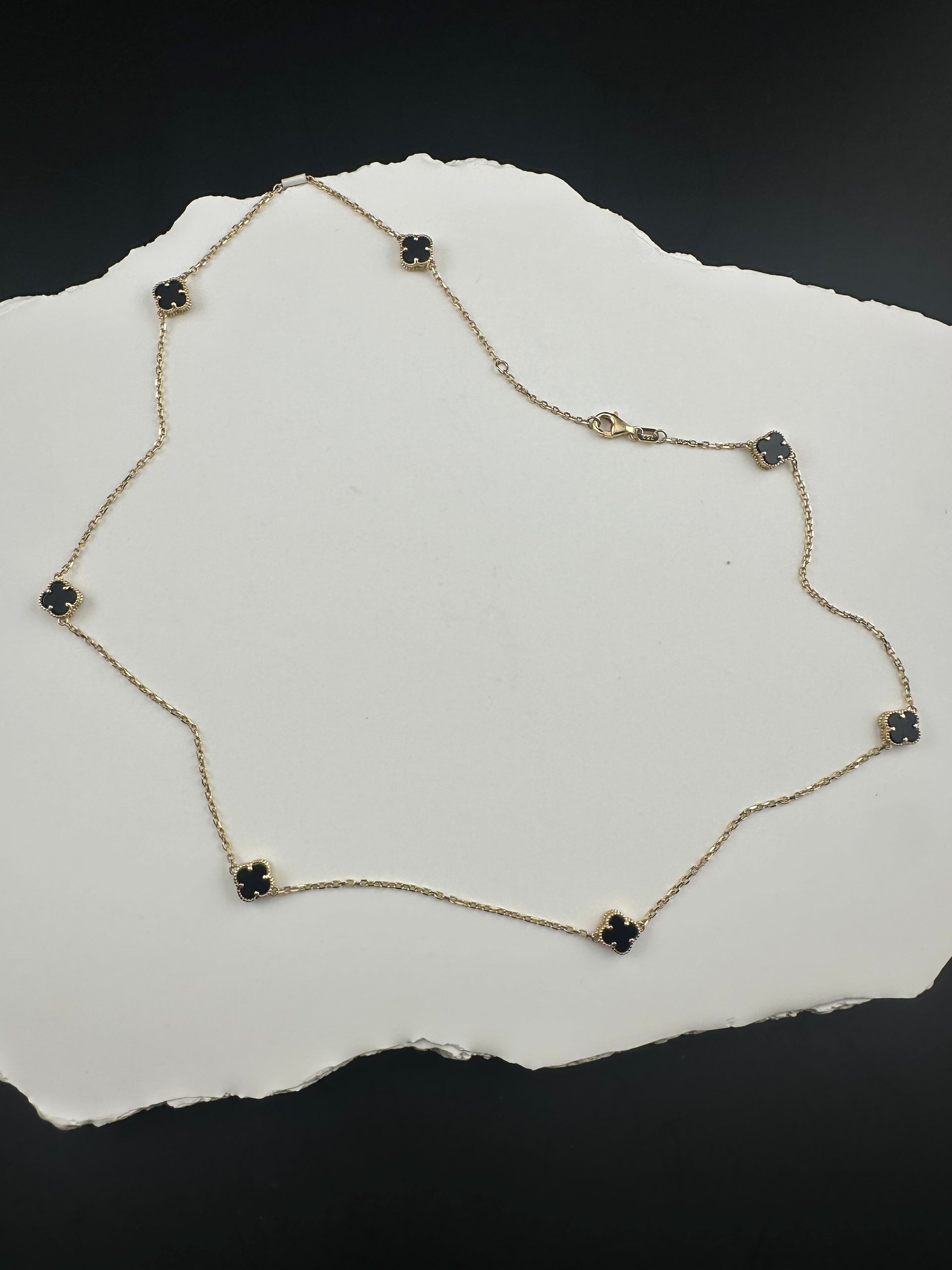The Notte d'Oro Clover: A Legacy in 18k Gold and Onyx