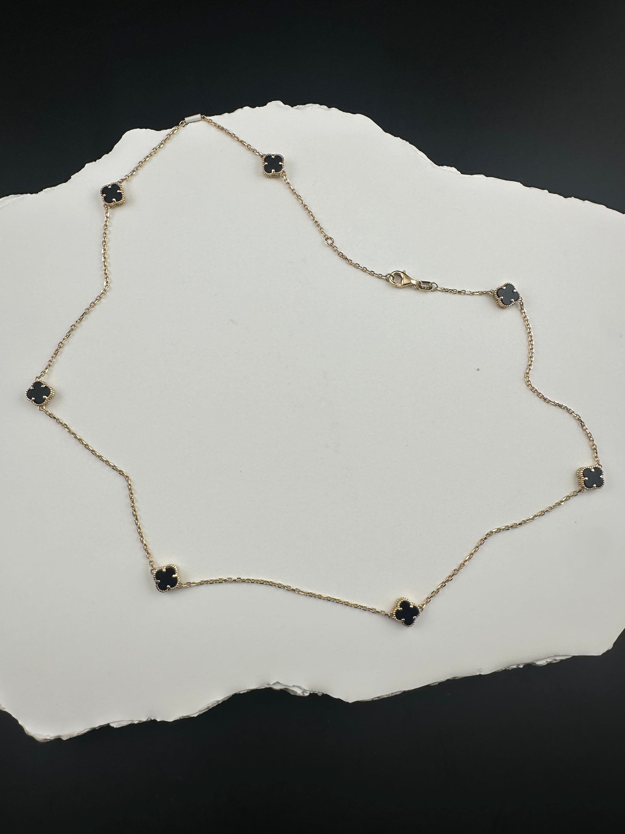 The Notte d'Oro Clover: A Legacy in 18k Gold and Onyx