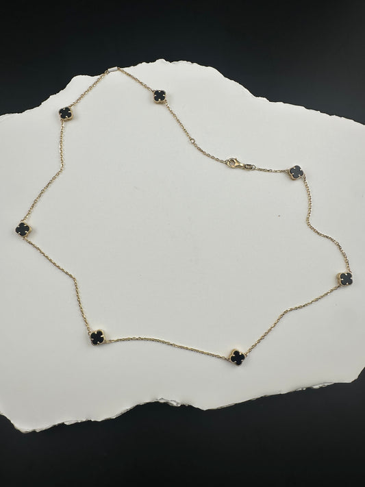 The Notte d'Oro Clover: A Legacy in 18k Gold and Onyx