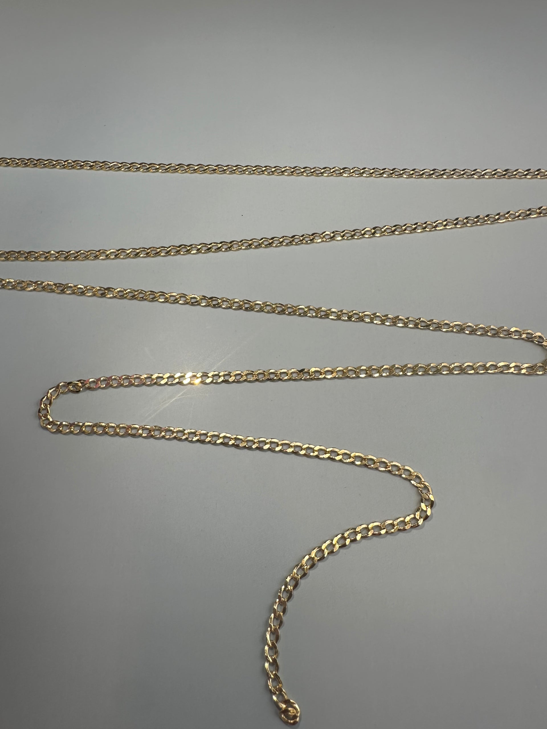 The Milano Curb: A Foundation in 14k Italian Gold