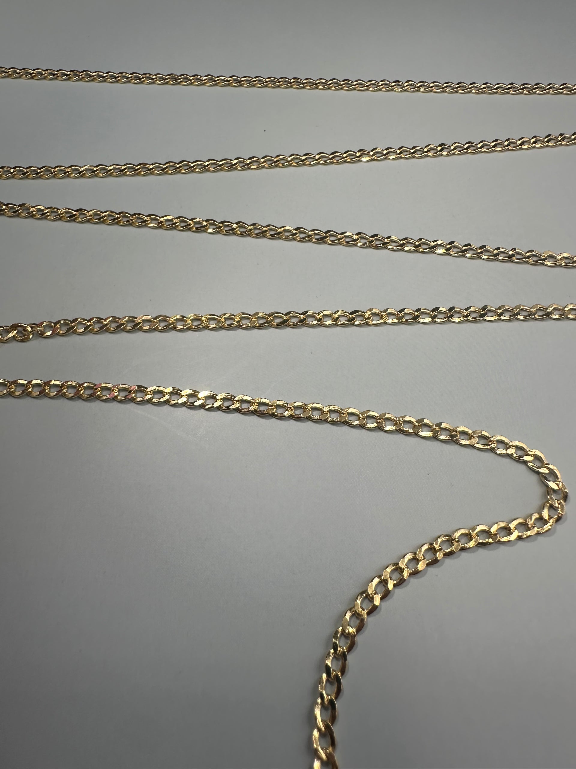 The Milano Curb: A Foundation in 14k Italian Gold