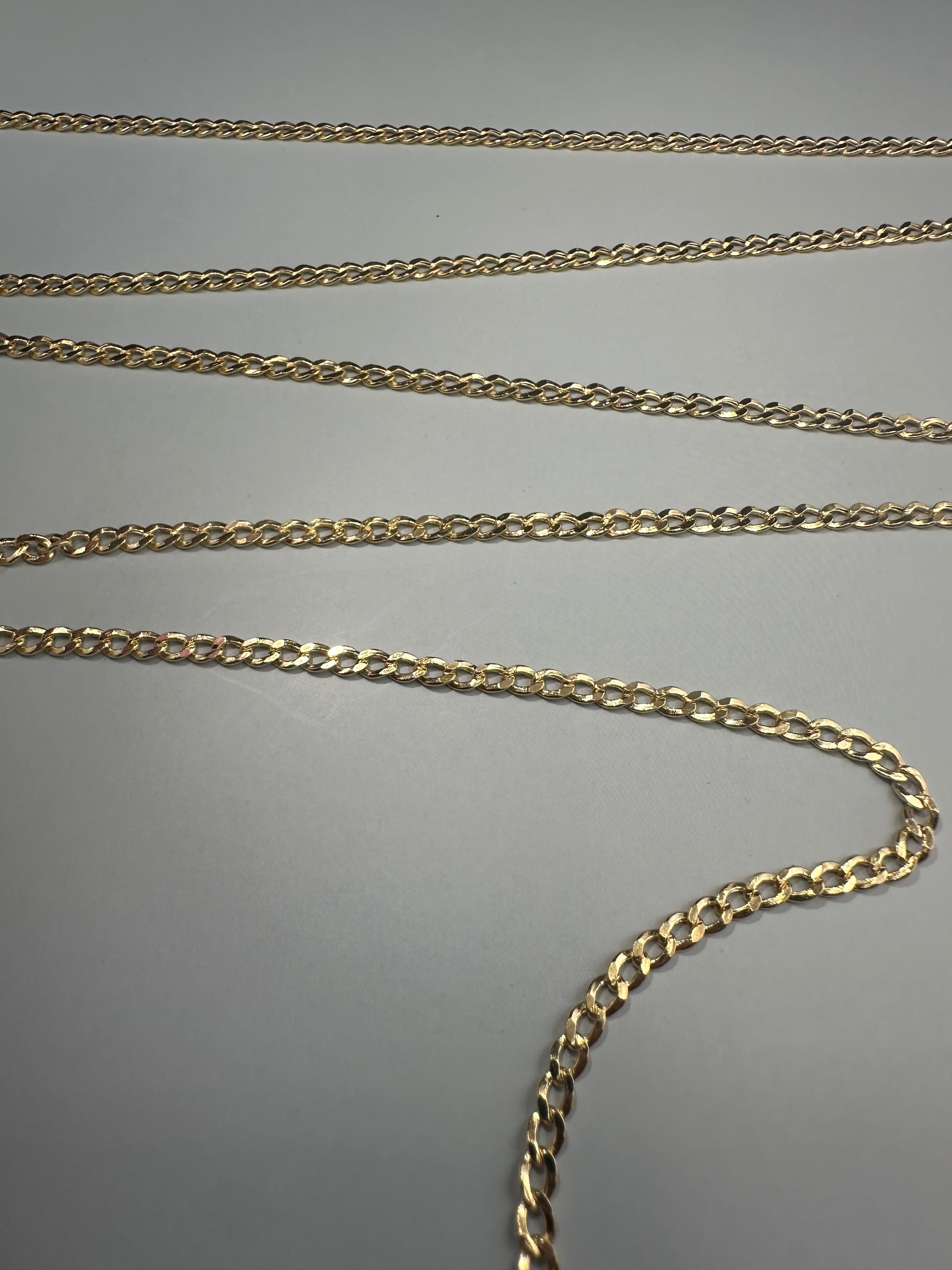 The Milano Curb: A Foundation in 14k Italian Gold