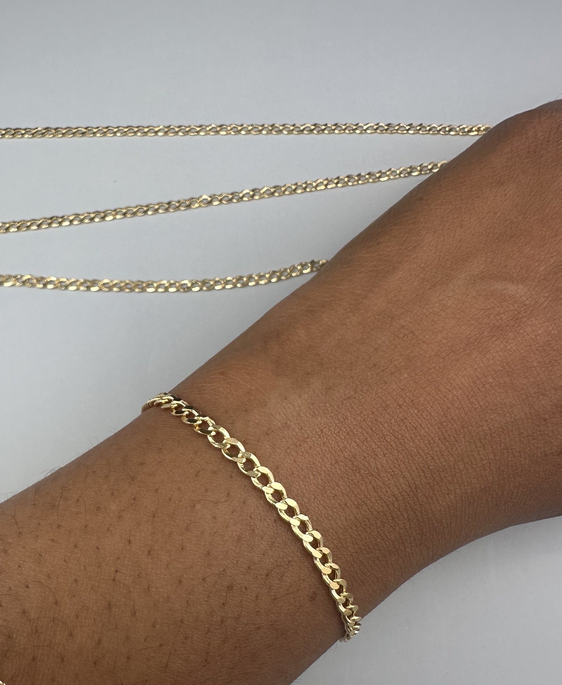 The Milano Curb: A Foundation in 14k Italian Gold